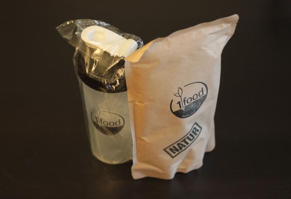 1food signature brown bag and shaker. The bags have a closing mechanism for re-use like Queal and Joylent.
